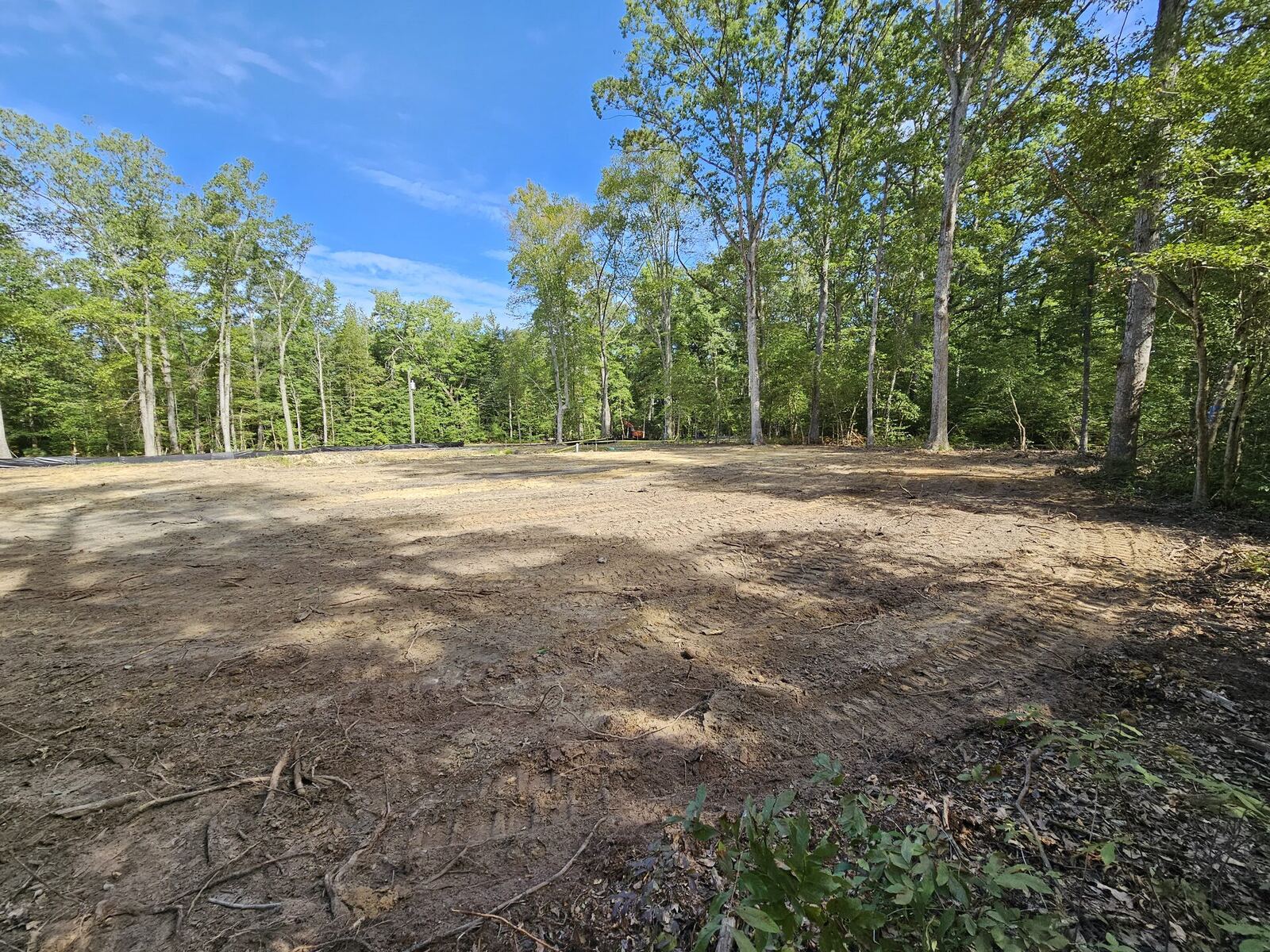 Finished land clearing project with cleaned and leveled property in Virginia