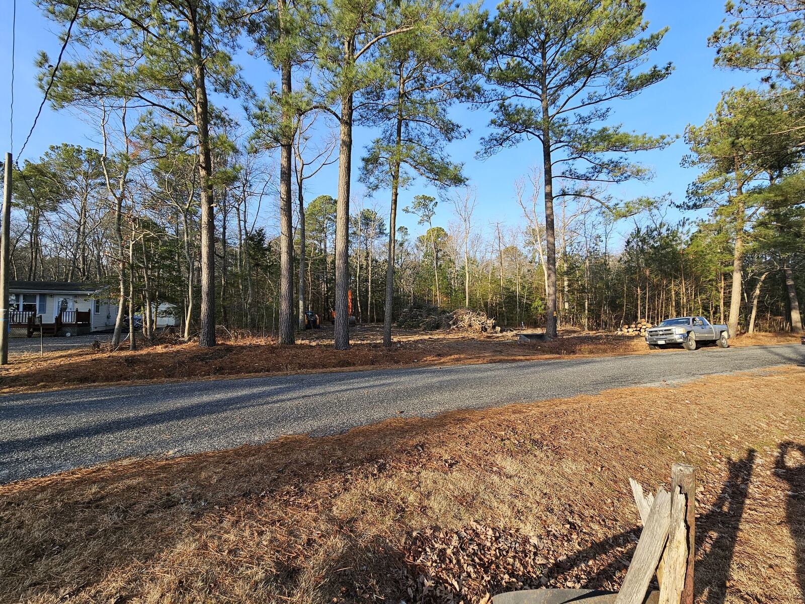 New gravel driveway with proper crown for water drainage